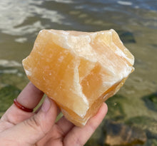 Load image into Gallery viewer, Large Rough Palm Size Orange Calcite